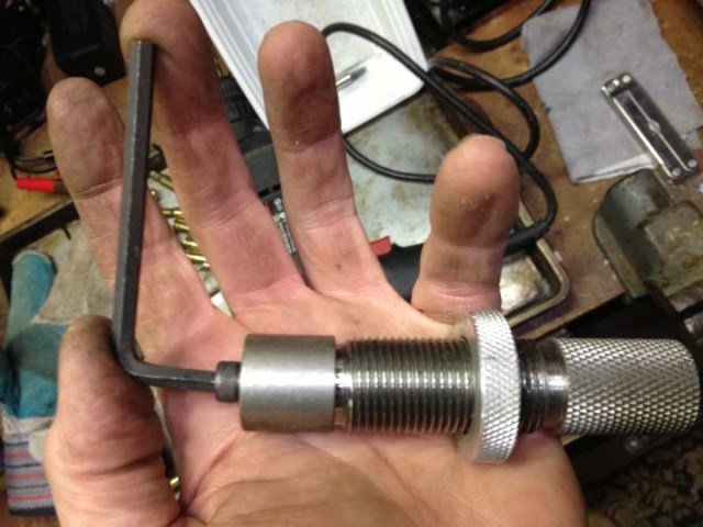 Snug up bolt and cup against die base.