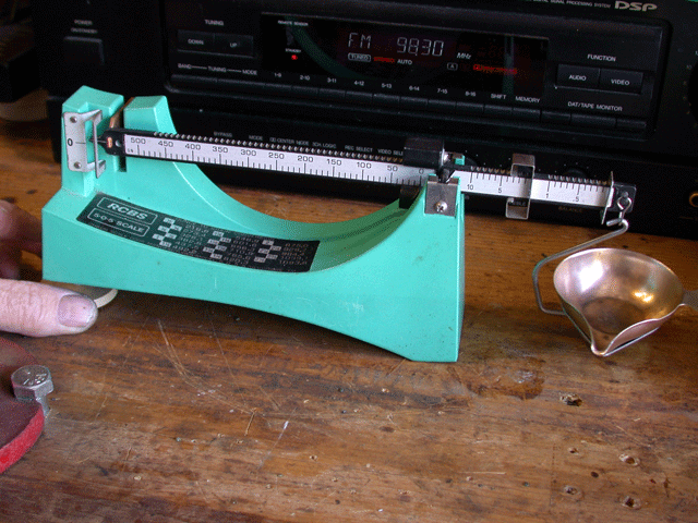 Showing setup of balance beam scale