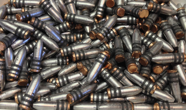 Showing Some cast lead RCBS 170 Grain Gas Checked , sized and lubed bullets.