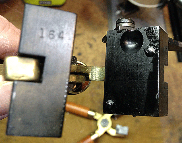 Showing a single cavity round ball mould with oil