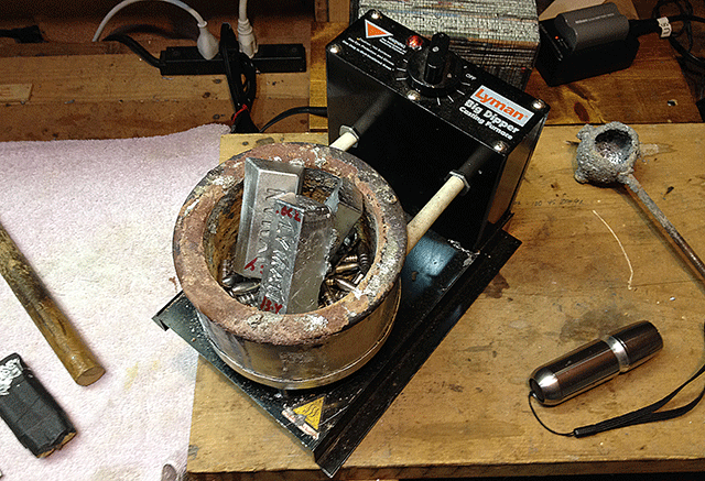 Showing a lead furnace with alloy and scrap lead