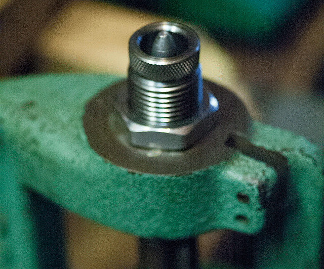 Showing cartridge passing through crimp die