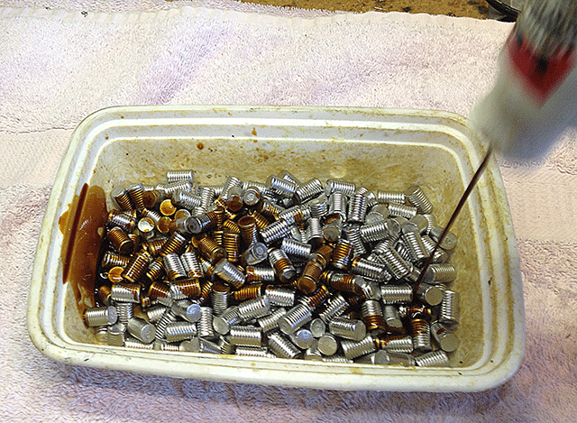 Showing lubing of cast bullets of tumble lube design